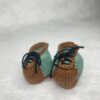 Chaussures pour animal de plus de 20 cm.